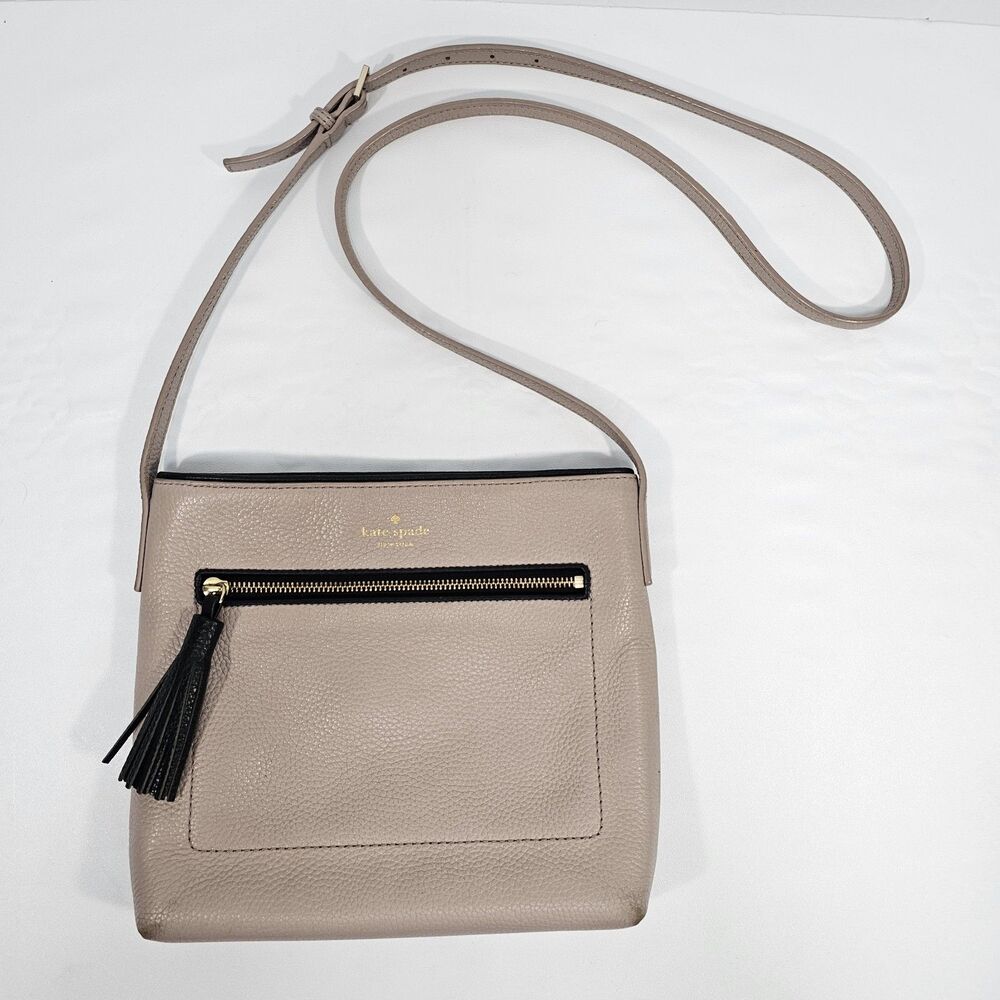 Kate Spade New York Pebbled Leather Tassel Crossbody Bag Taupe Grey Black Trim